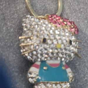 Macy's Crystal Hello Kitty Keychain with Pink Bow and Teal Outfit